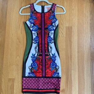 Flying Tomato sleeveless dress. GORGEOUS colors. Never worn size Xtra small